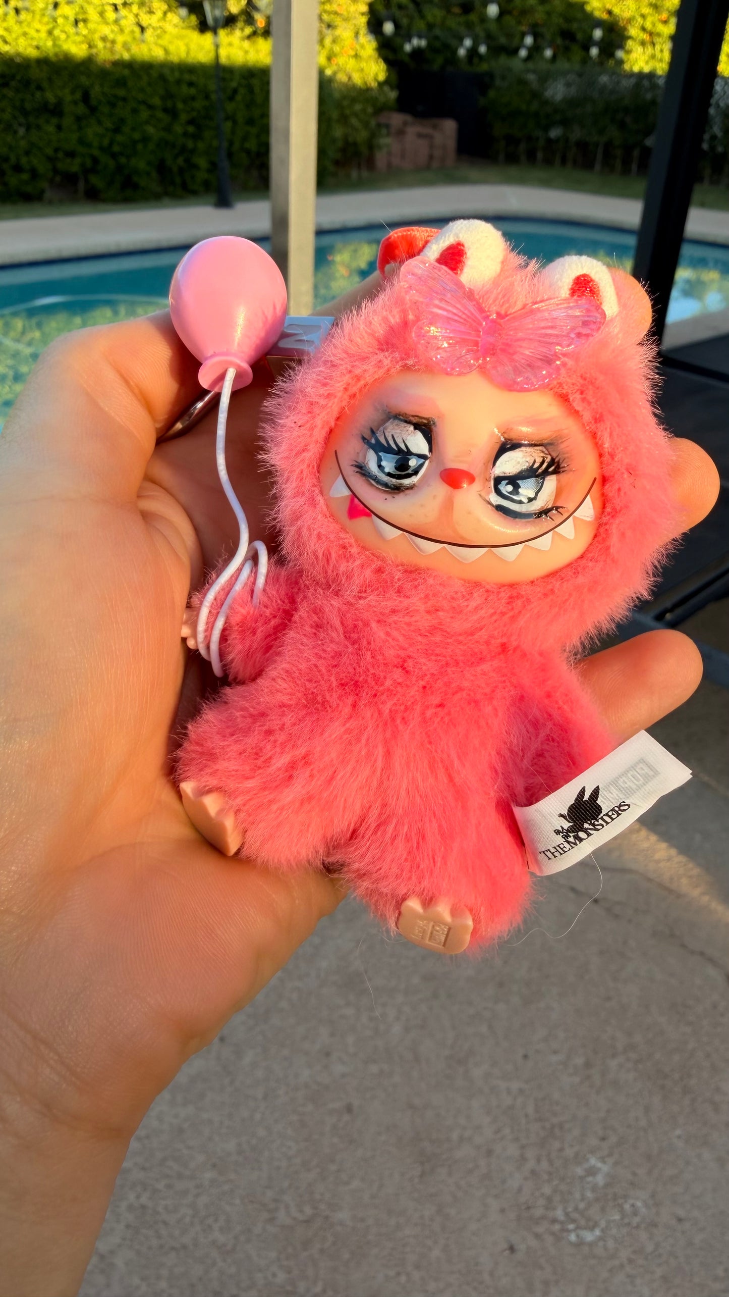 Pink Furry Toy with Balloon