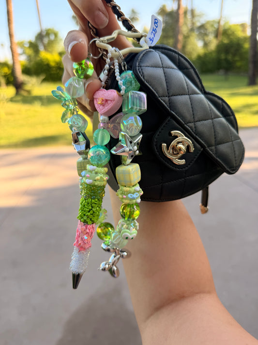 Beaded purse, pen and pendant