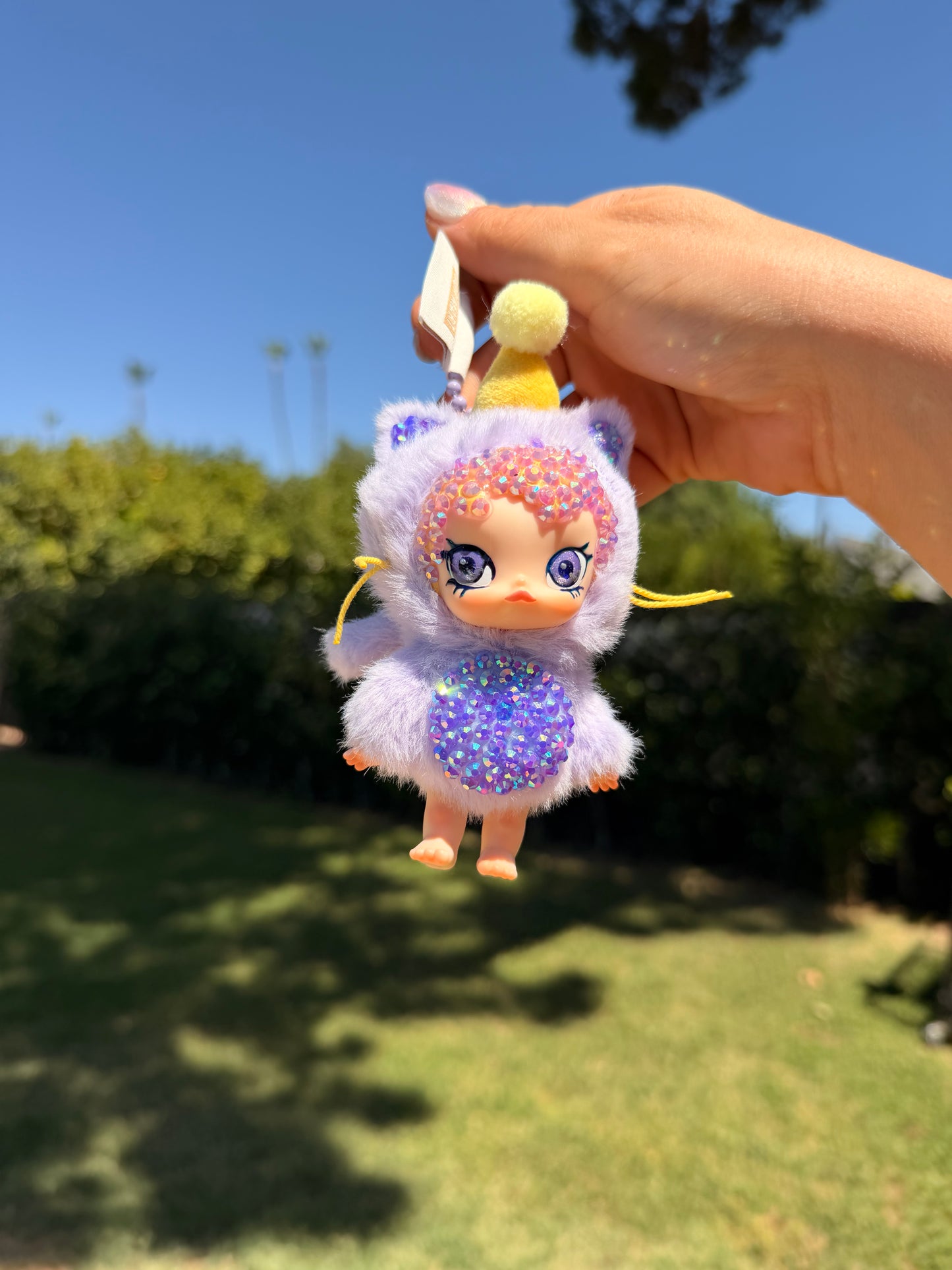Custom designed and hand bedazzled Molly Plush Keychain