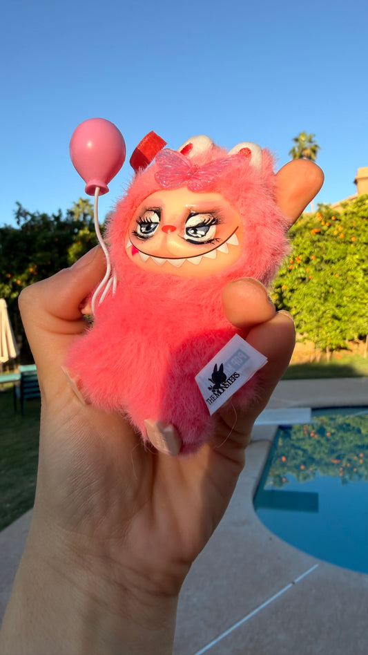 Pink Furry Toy with Balloon