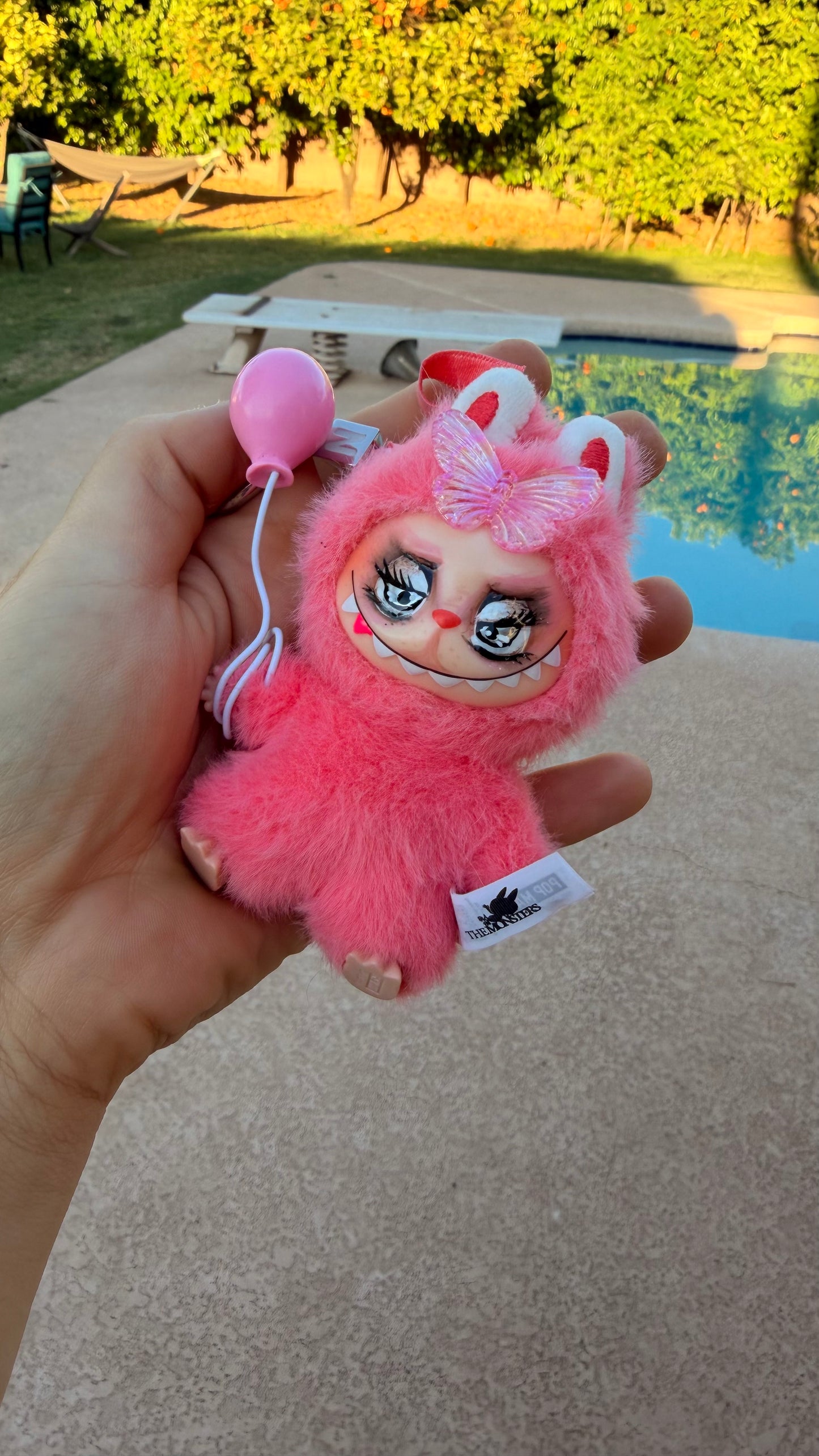 Pink Furry Toy with Balloon
