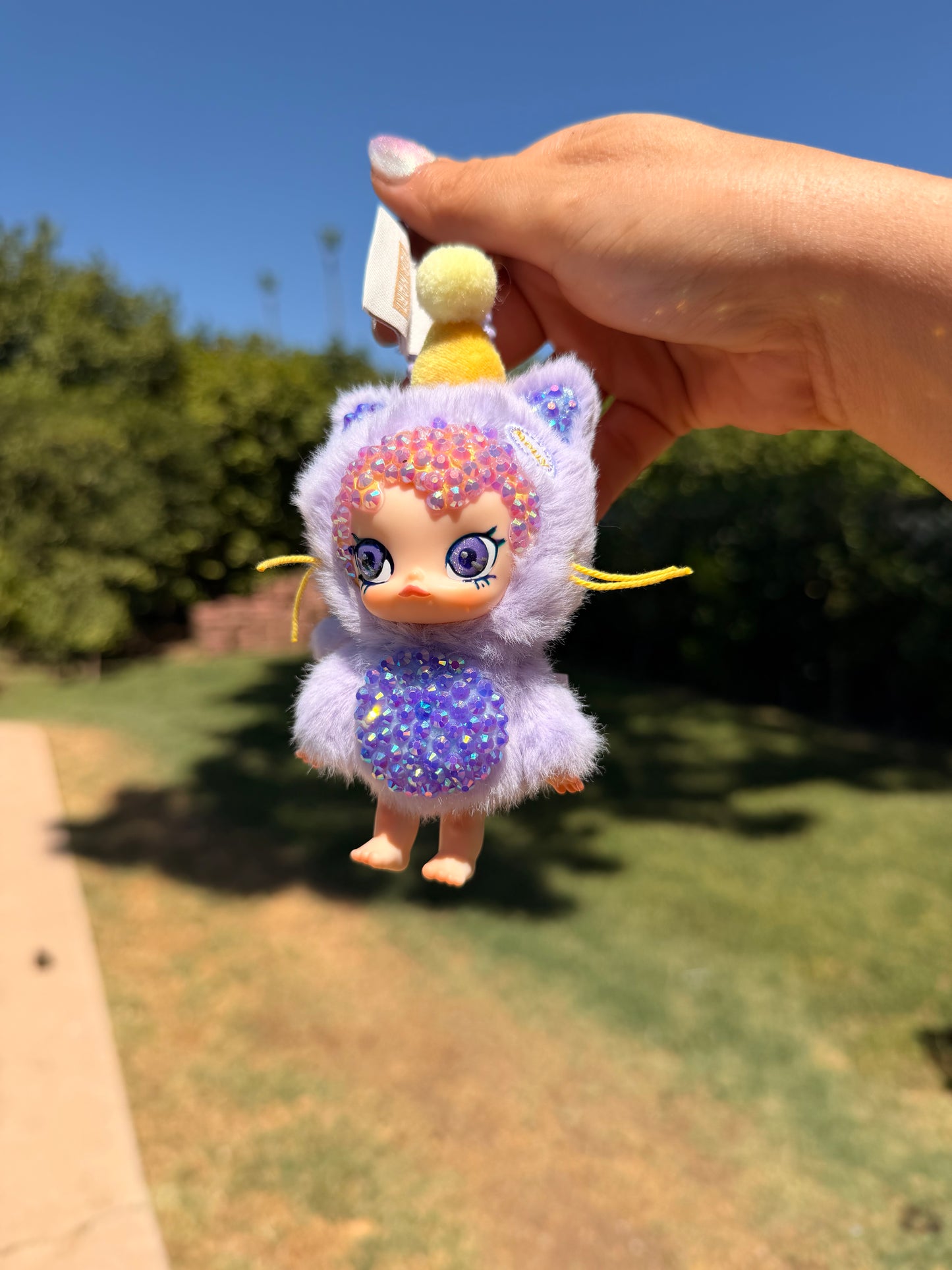 Custom designed and hand bedazzled Molly Plush Keychain