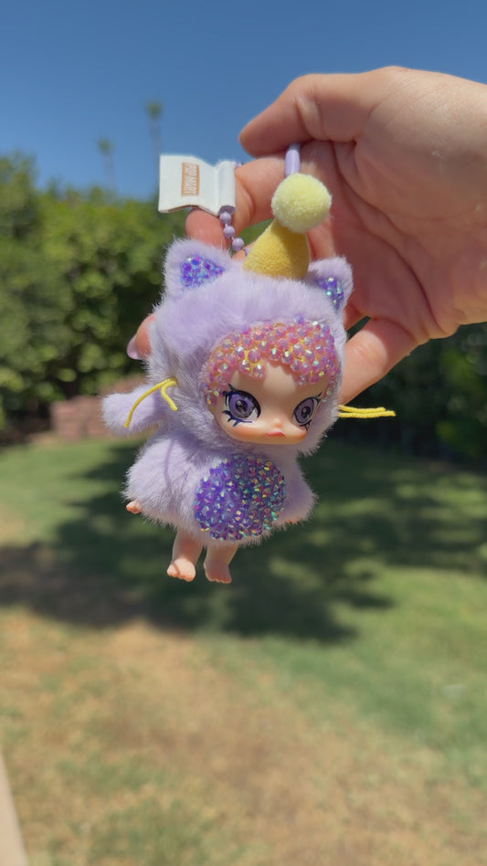 Custom designed and hand bedazzled Molly Plush Keychain